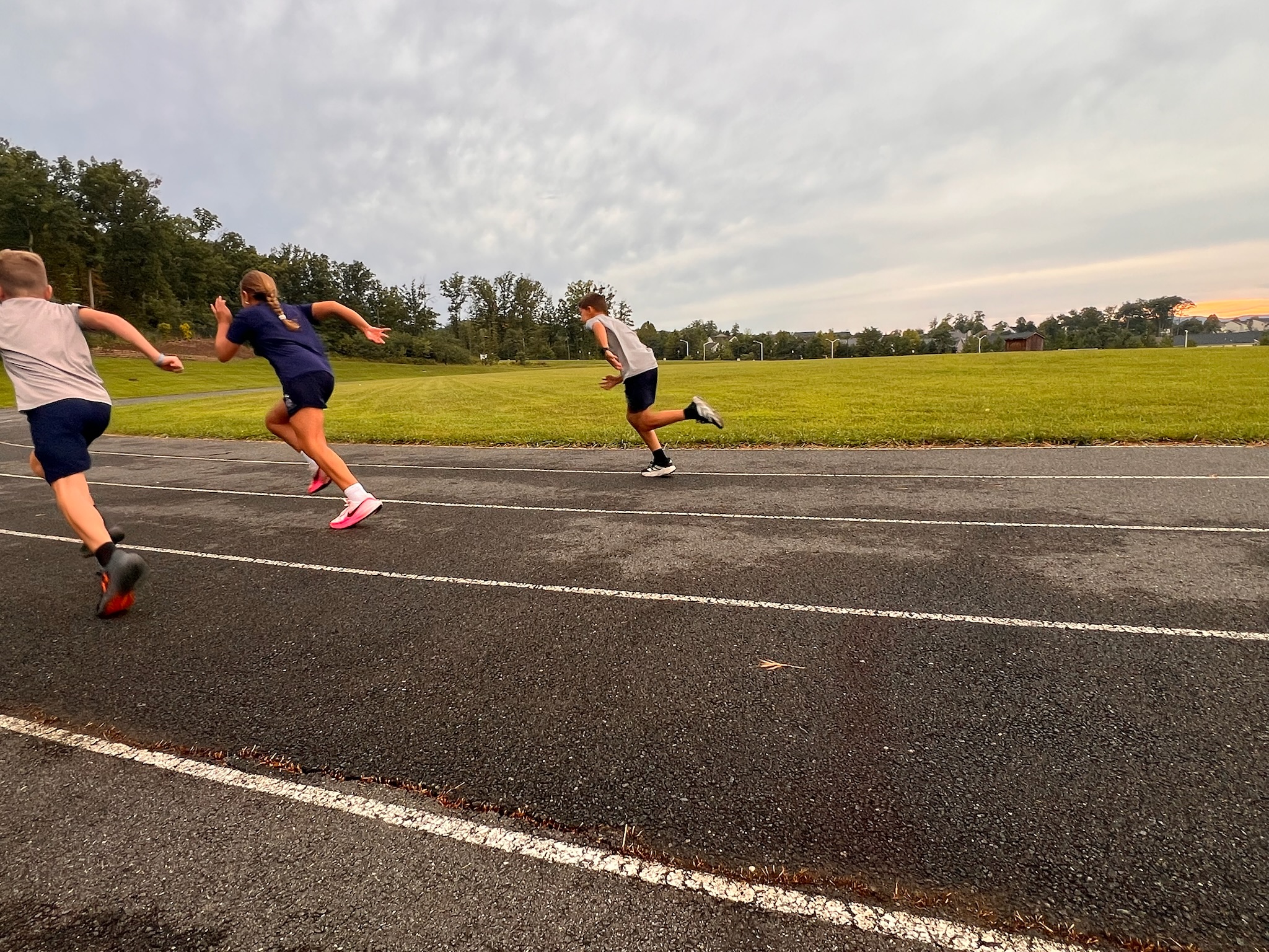 Students running in coordinated MODSport PE Kits
