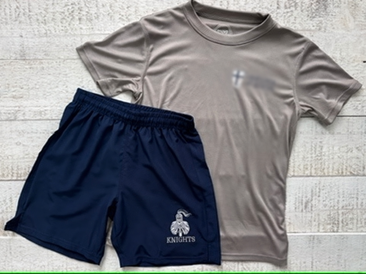 Gray performance shirt and navy shorts customized as a MODSport youth PE Kit